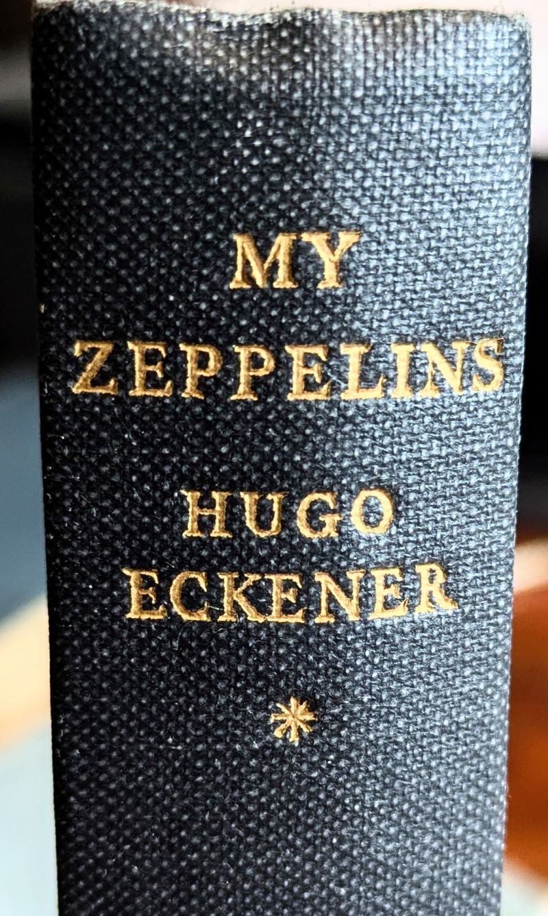 Picture of book's spine showing gilt title and author in gilt lettering